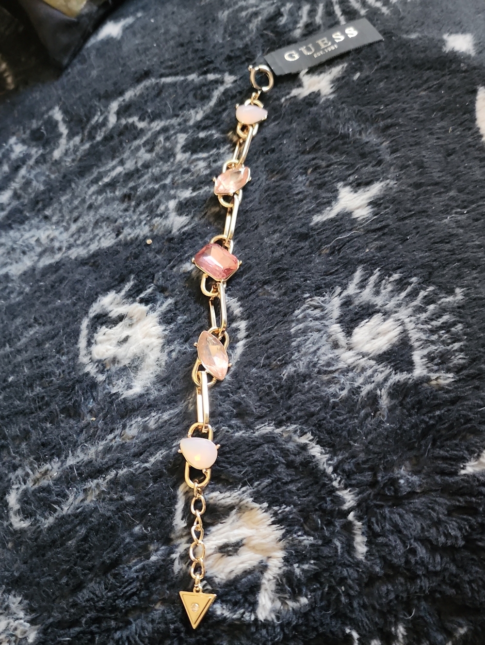 GUESS Gold-Tone Bracelet with Pink Gemstones